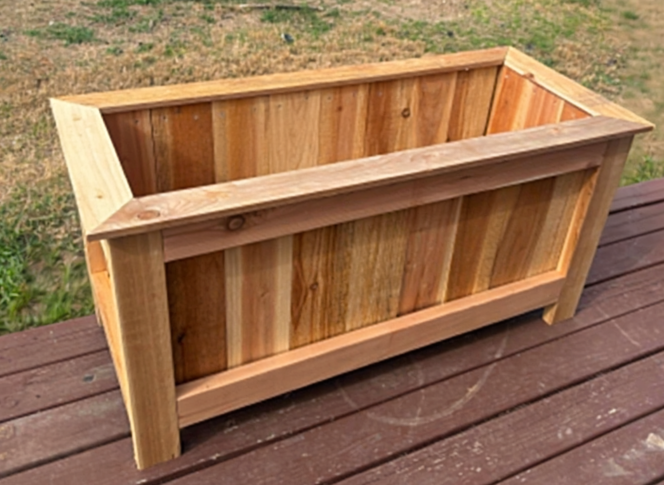 Completed cedar planter box on a deck